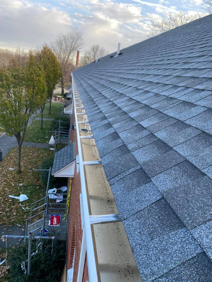 Gray asphalt roofing installed on townhouse complex